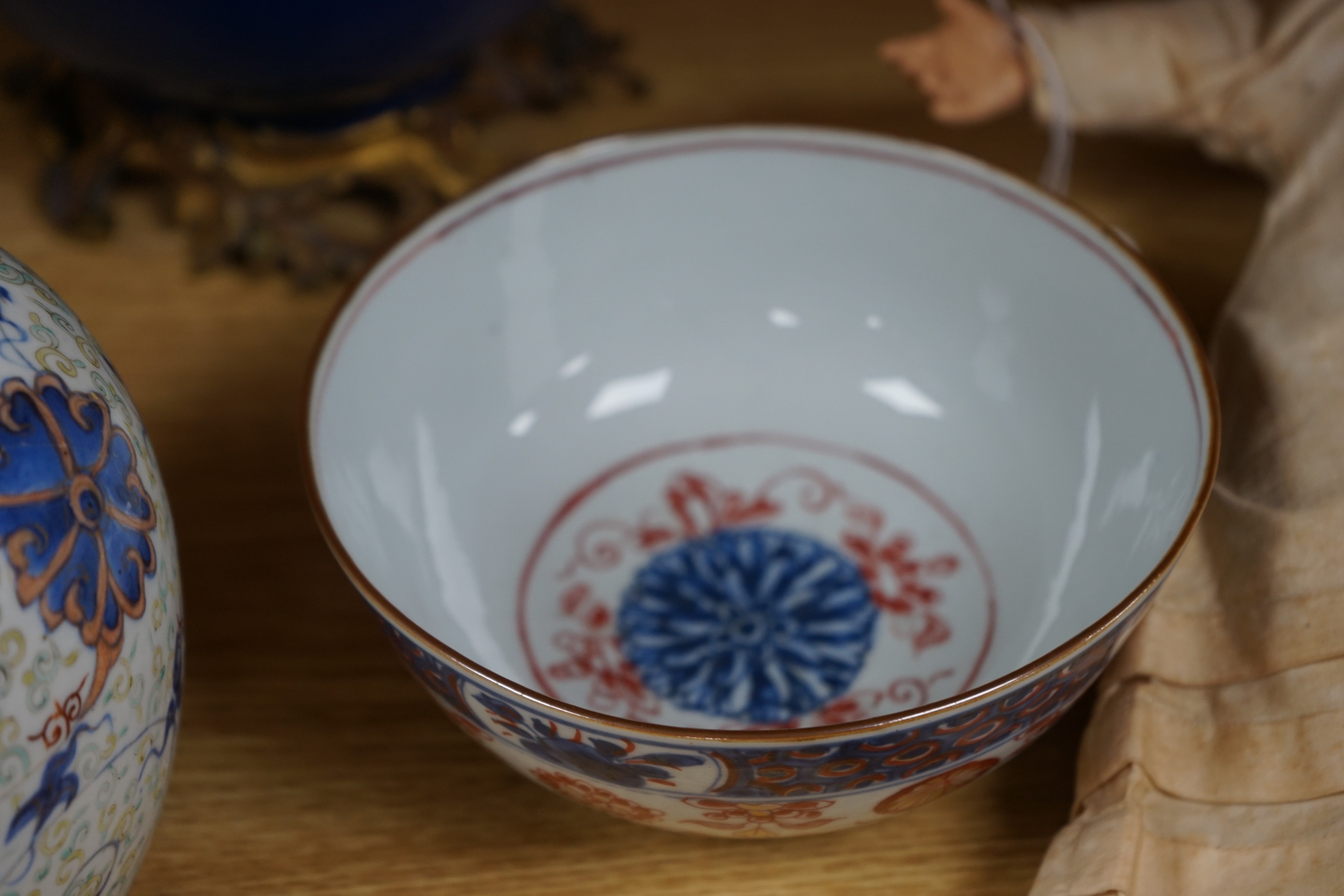 An 18th century Chinese clobbered blue and white bowl, a Samson powder blue ormolu mounted bowl, 19.5cm wide and a 19th century Chinese doucai style jar